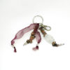 Bijoux de sac avec brut de quartz et rhodochrosite.